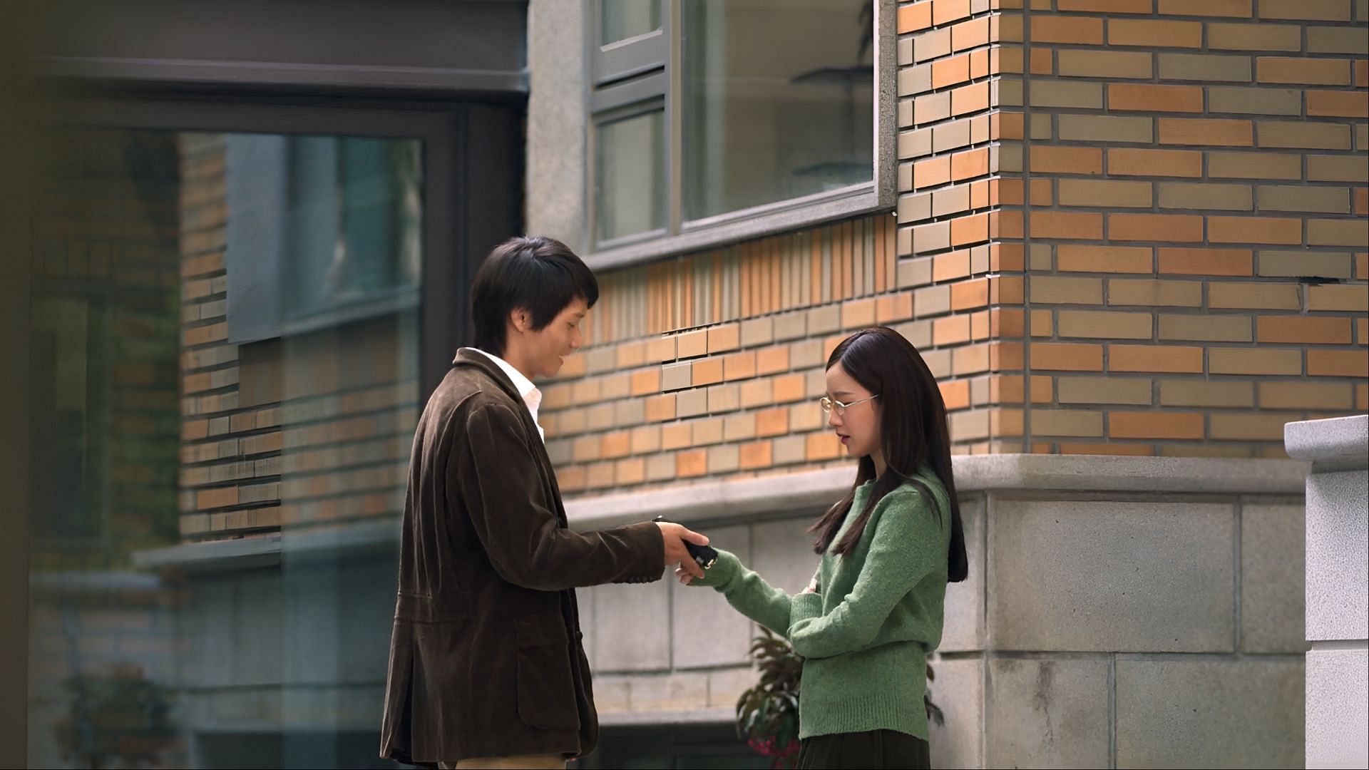 Santi returns Xiaoyu's investment in a quiet, emotional exchange, one that marks both closure and enduring gratitude. (Image via Netflix)